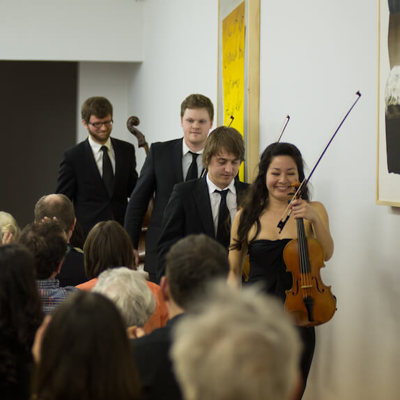 Aeolus String Quartet leaving the performance space