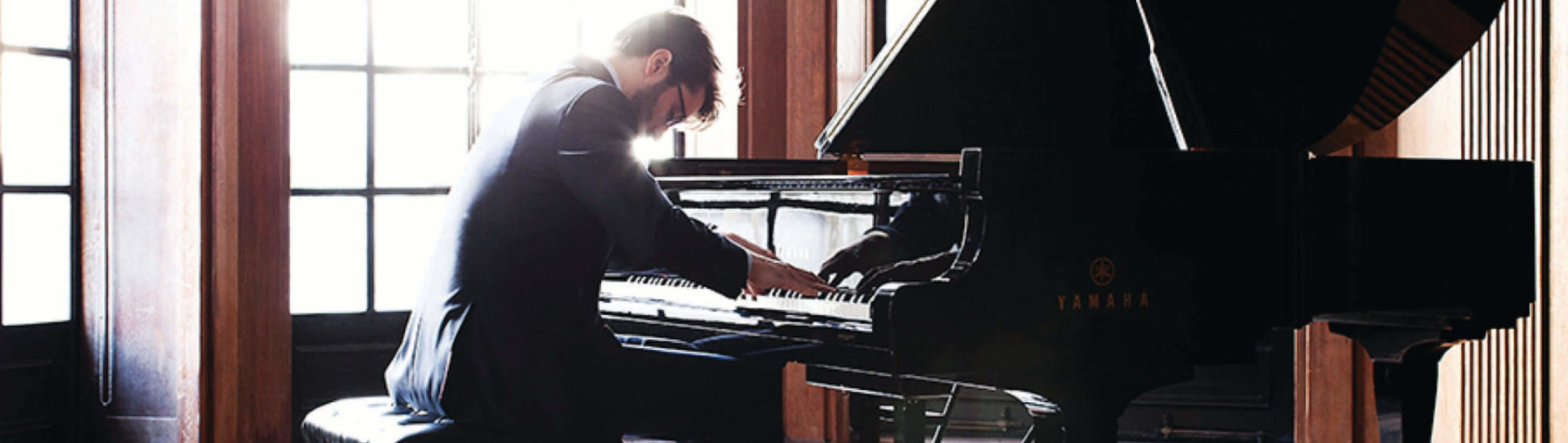 David Kaplan playing the piano