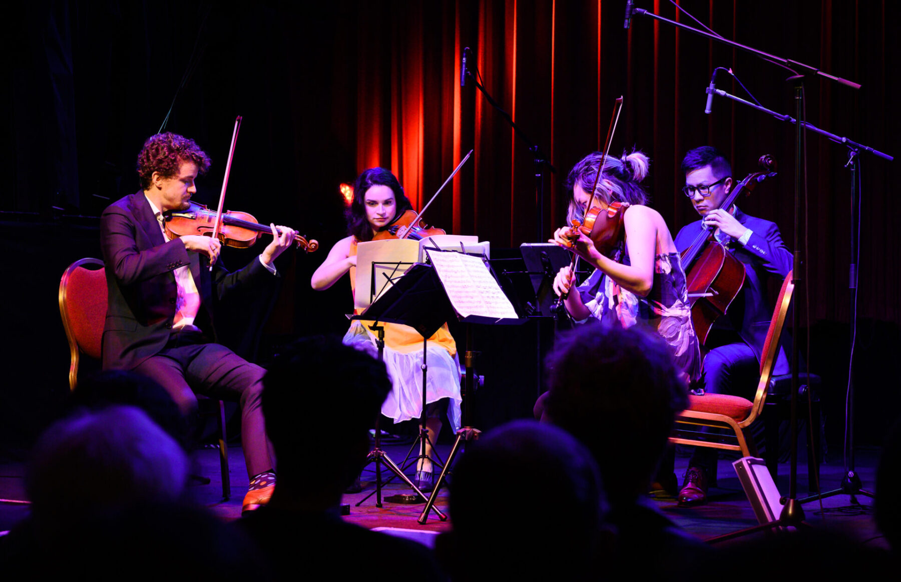 Capilano String Quartet premiere performance at the Fox Cabaret, bathed in purple light
