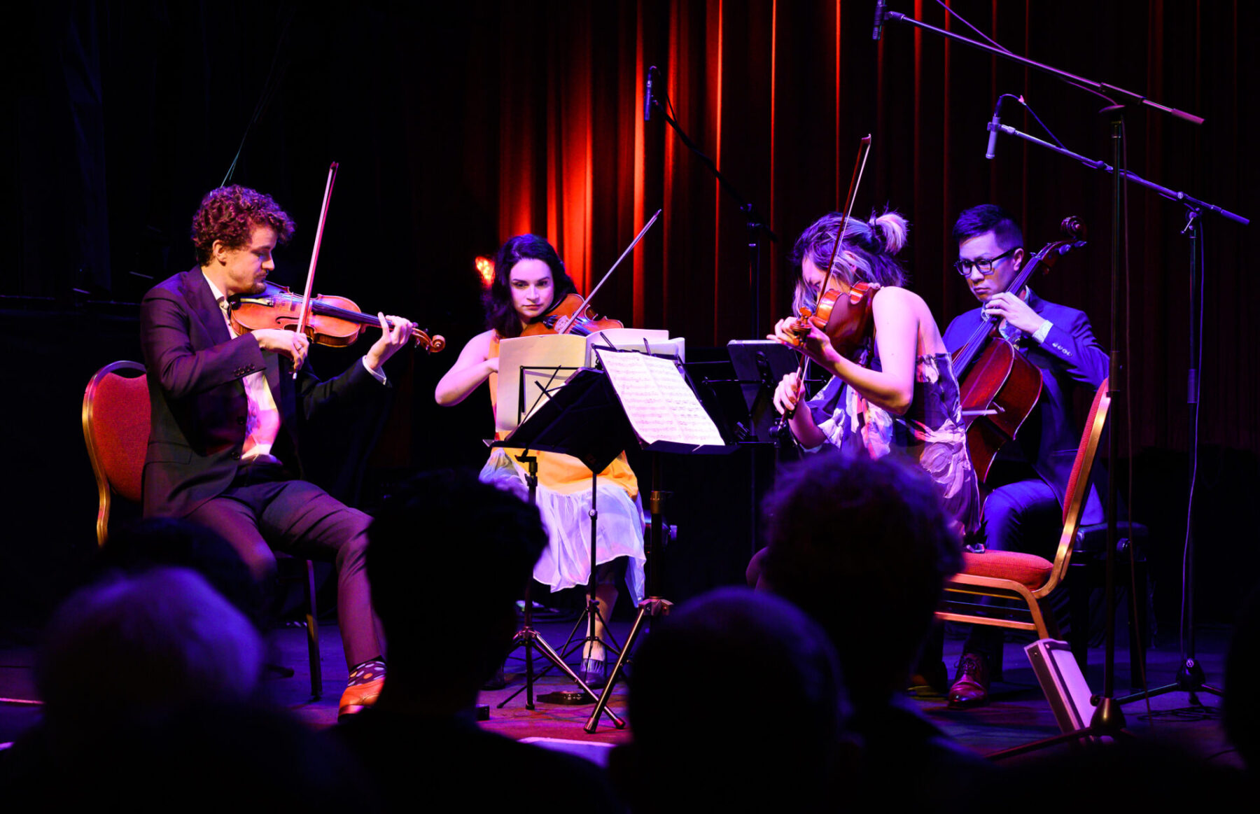 Capilano String Quartet premiere performance at the Fox Cabaret, bathed in purple light