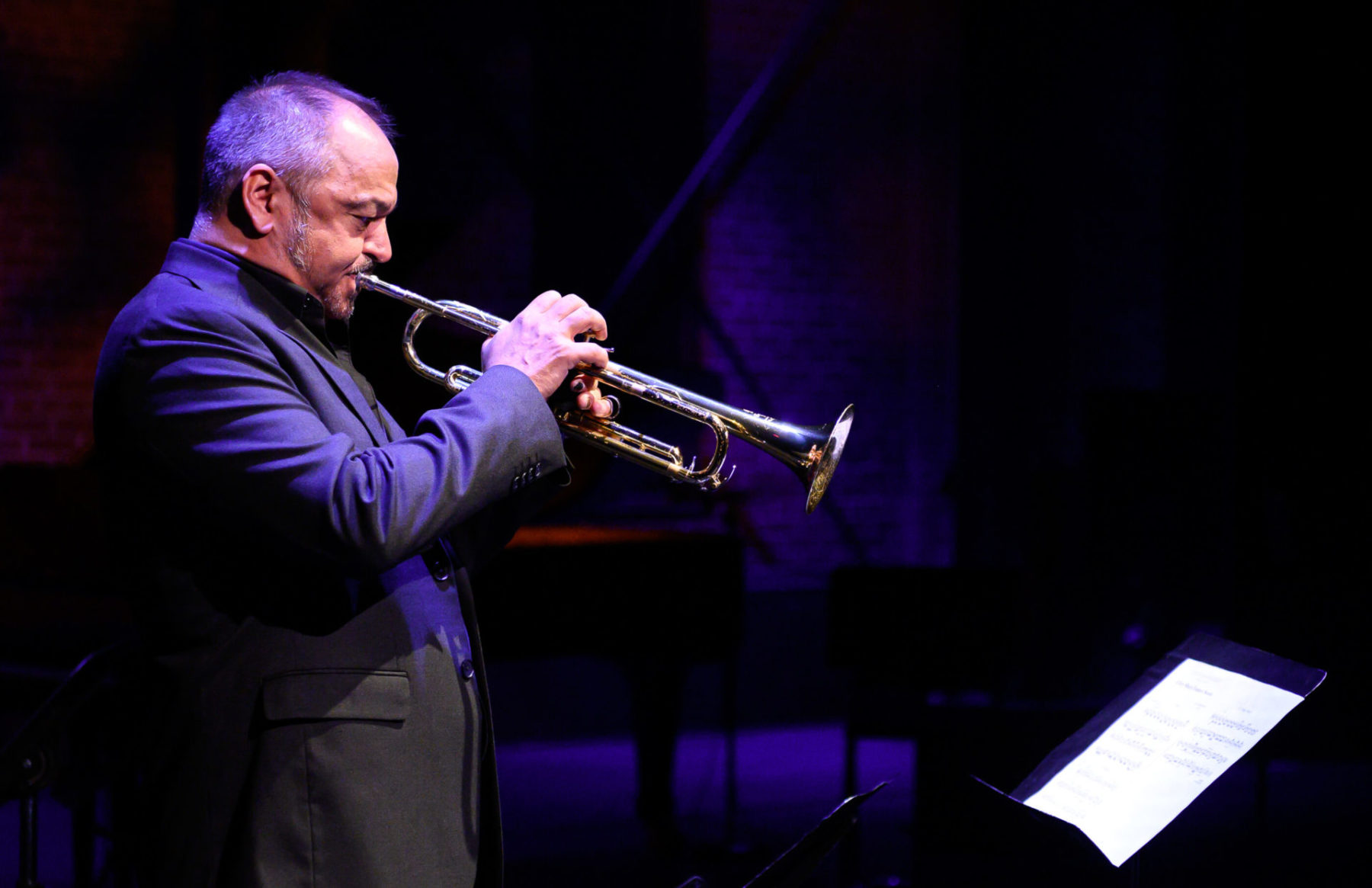 John Korsrud playing the trumpet