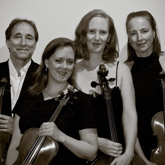 Marc Destrubé, Tawnya Popoff, Andrea Siradze, and Rebecca Wenham posing with their instruments