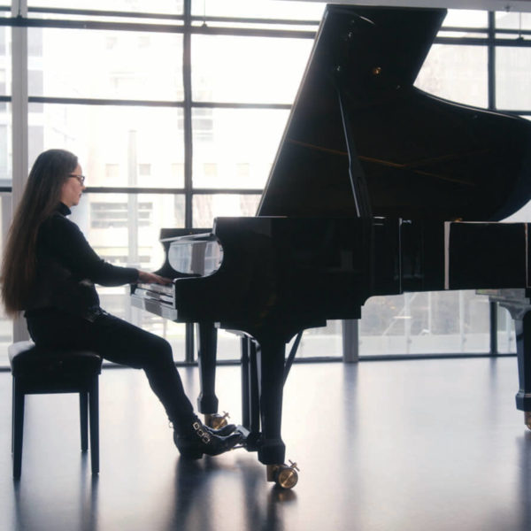 Rachel Kiyo Iwaasa playing the piano