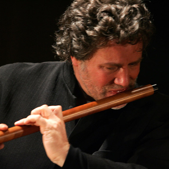 Close up of Norbert Rodenkirchen playing a medieval flute