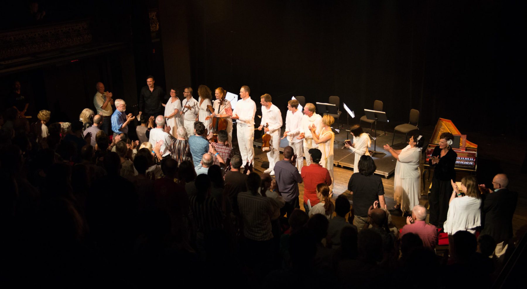 The Orpheus Project company clapping at the end of the show